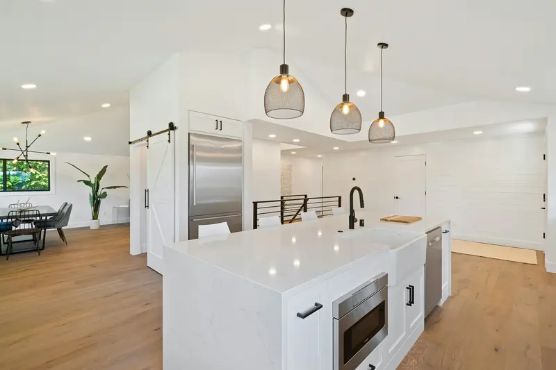 Bright white kitchen with a large island
